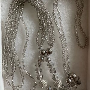 Silver/clear beads - no name brand - hangs to 23 inches - no clasp